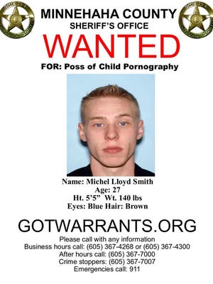 An image of Michel Lloyd Smith, who is wanted for allegedly trading sexual messages and images with a 13-year-old
