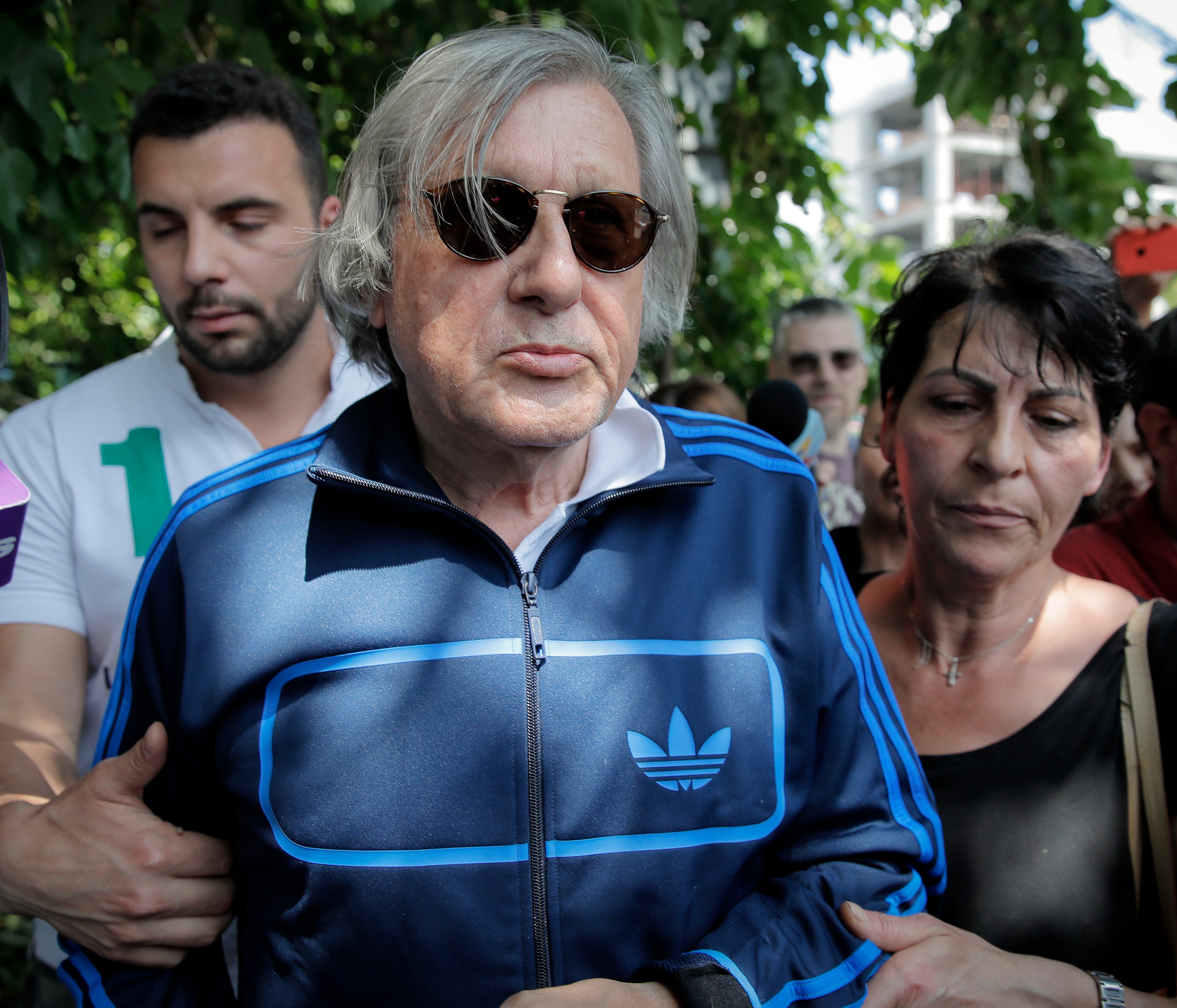 Former tennis player Ilie Nastase is released from police headquarters in Bucharest, Romania, following his second traffic arrest within hours.