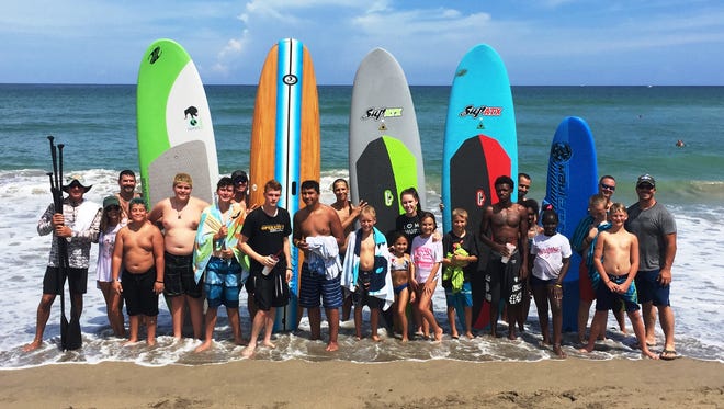 Surf’s up at an Operation 300 weekend adventure camp in Stuart.