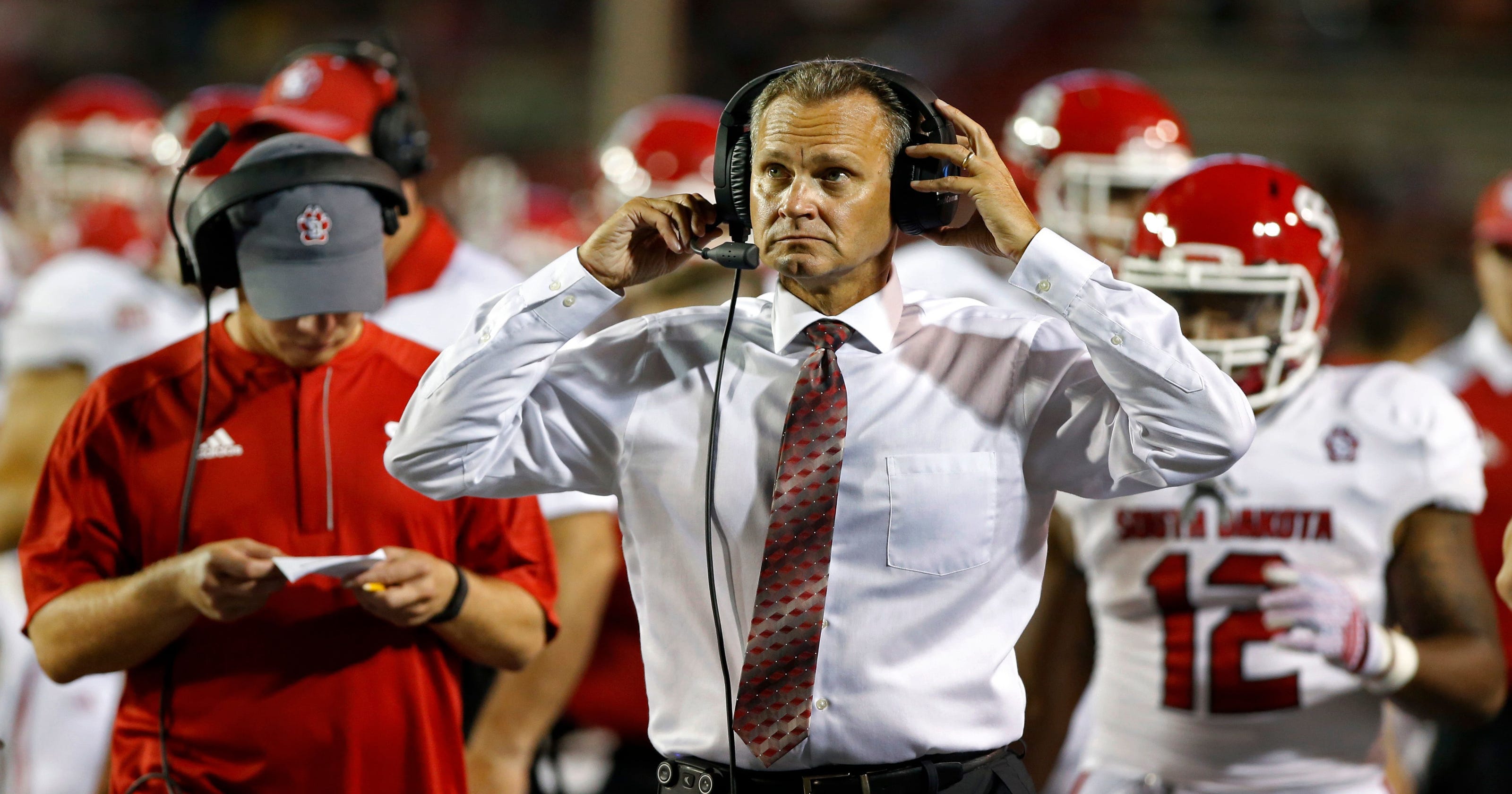 South Dakota hires a pair of assistant football coaches