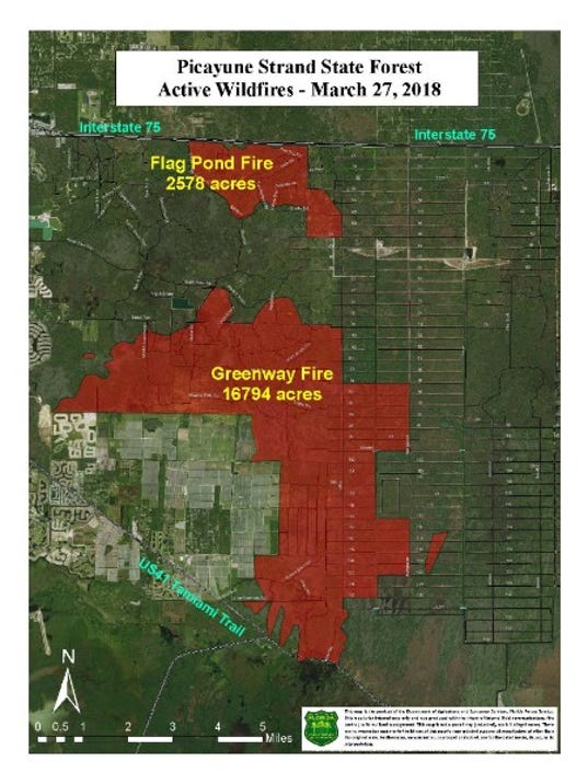 Wind blows Greenway Fire near U.S. 41 and homes southeast of Naples