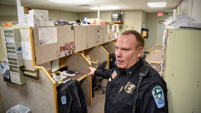 Sartell Police Department Chief Jim Hughes talks in the department's squad room in a Times file photo.