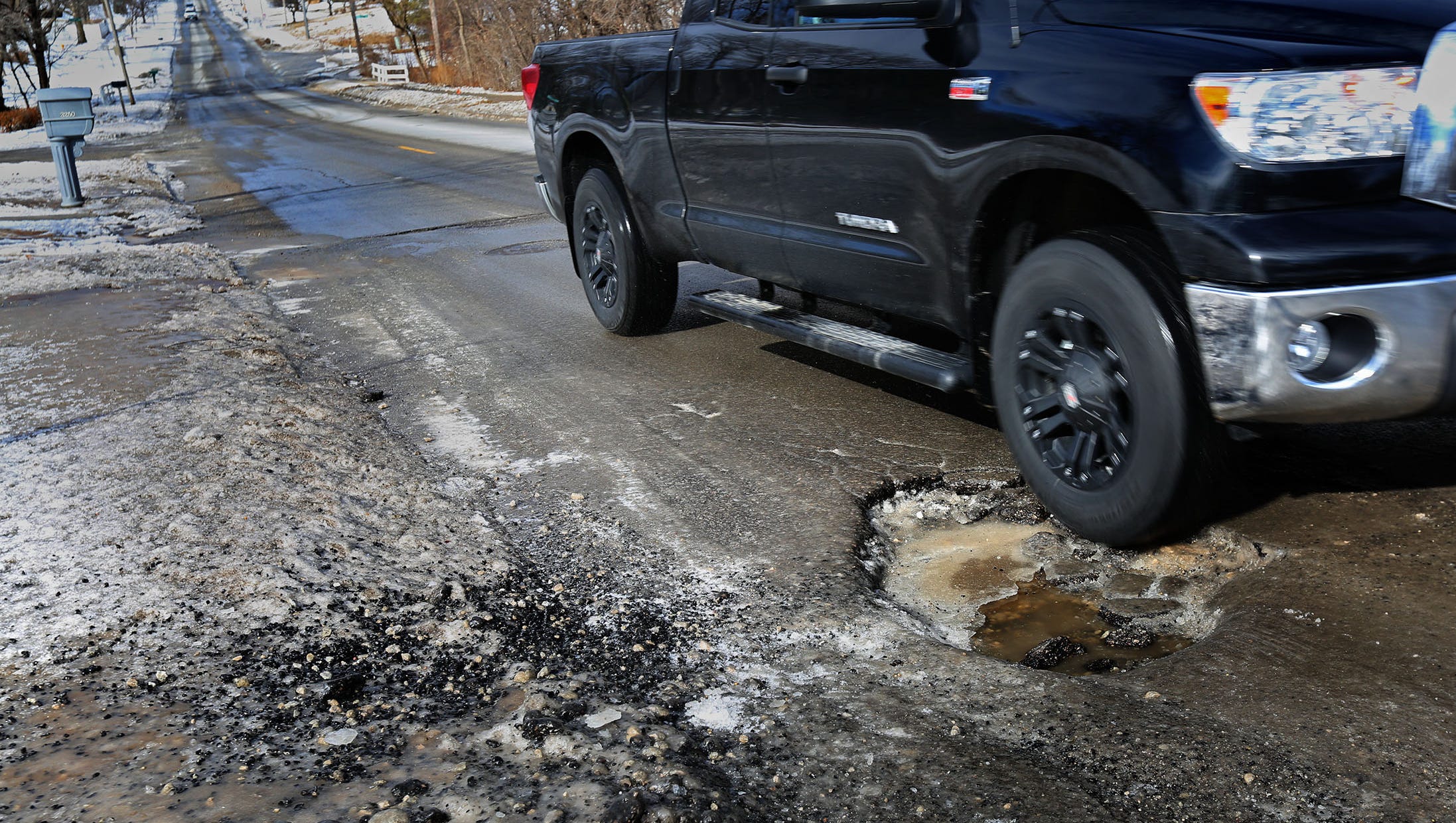 How to avoid potholes and prevent potential damage to your car