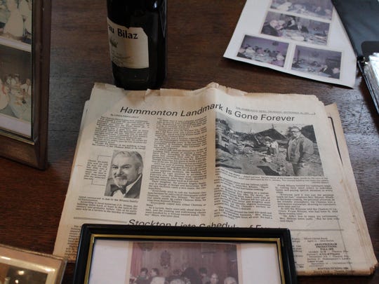 A newspaper article about the removal of debris from a fire that destroyed the Chateau Bilaz from the collection of Angela Donio.