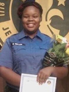 Breonna Taylor, a 26-year-old emergency medical technician, died after being shot at least eight times in March when three Louisville Metro police officers entered her apartment by force to serve a no-knock search warrant in a narcotics investigation and exchanged gunfire with her boyfriend who thought it was a home invasion.