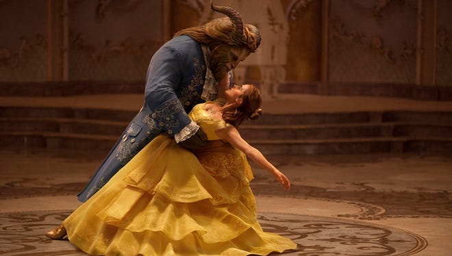 Emma Watson as Belle and Dan Stevens as the Beast star in "Beauty and the Beast," a live-action adaptation of the studio's animated classic.