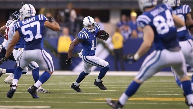 Indianapolis Colts kick returner Quan Bray (11) looks for running room  in the first half of their game. The Indianapolis Colts lost to the Houston Texans 16-10 Sunday, December 20, 2015, afternoon at Lucas Oil Stadium.