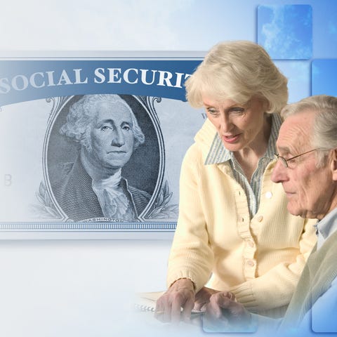 A senior couple with a Social Security card that h