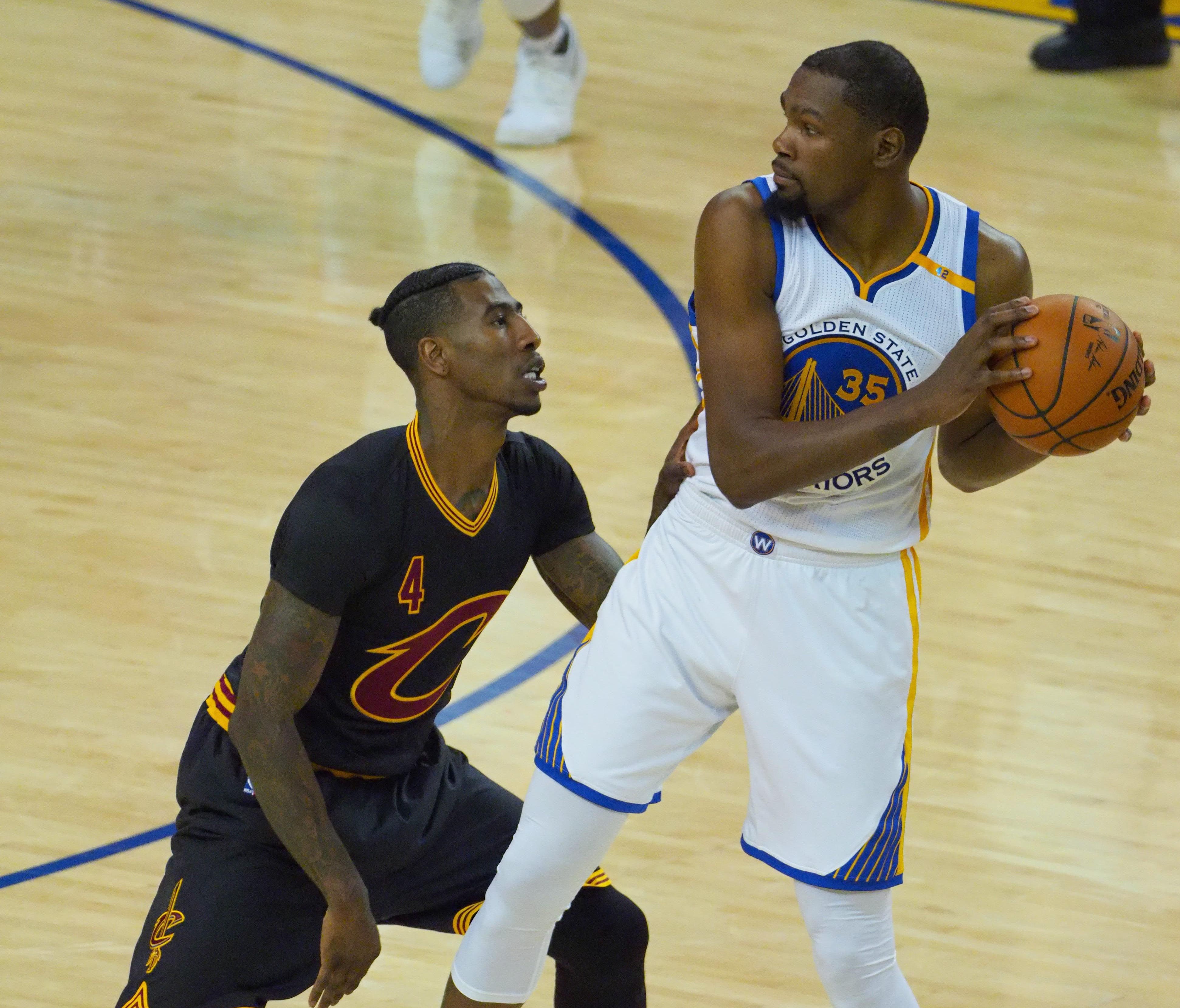 Kevin Durant (35) is defended by Iman Shumpert (4) during the first half in Game 2 of the 2017 NBA Finals.