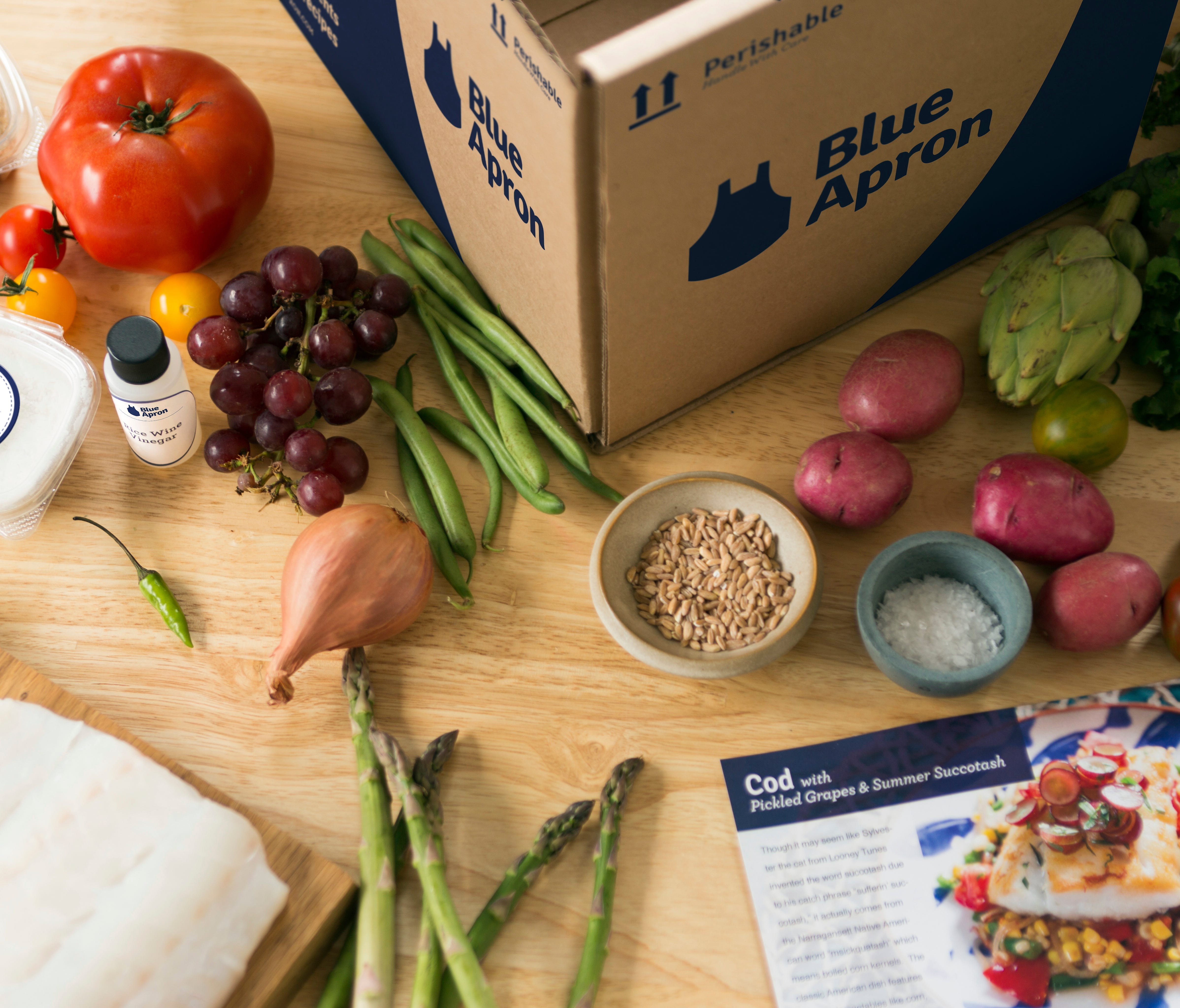 Handout file photo taken in 2013 shows an example of ingredients in a Blue Apron meal-kit delivery box.