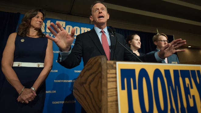 U.S. Sen. Pat Toomey of Pennsylvania speaks to supporters following his election victory Nov. 8 in Breinigsville, Pa.