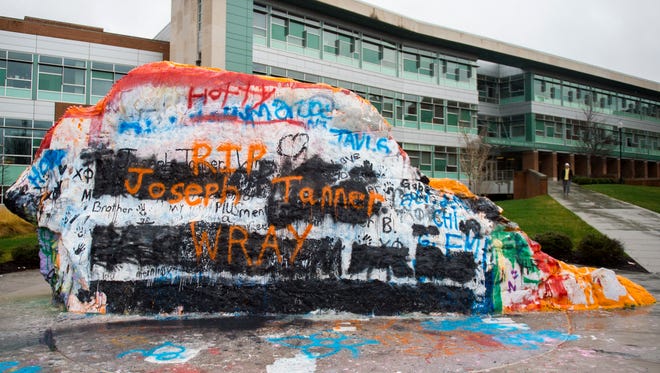 "RIP Joseph Tanner Wray" is painted on The Rock on the University of Tennessee's campus on Monday, February 26, 2018.