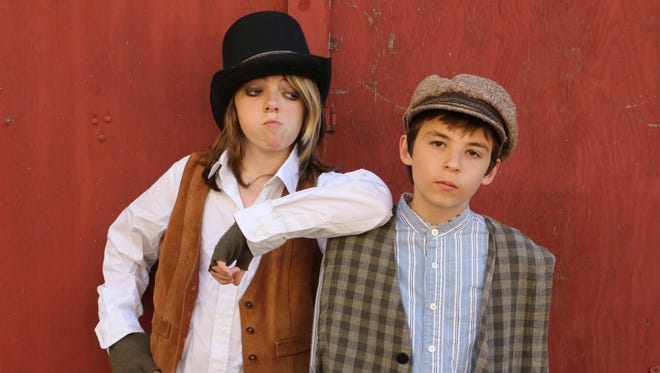 The Artful Dodger (Gabe Guignard) and Oliver (Logan Coolidge) star in "Oliver!"