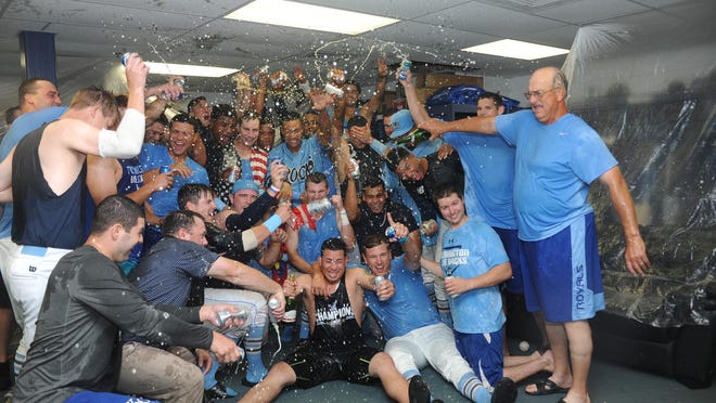 The Blue Rocks celebrate winning the Carolina League Northern Division Championship Series on Friday at Frawley Stadium.