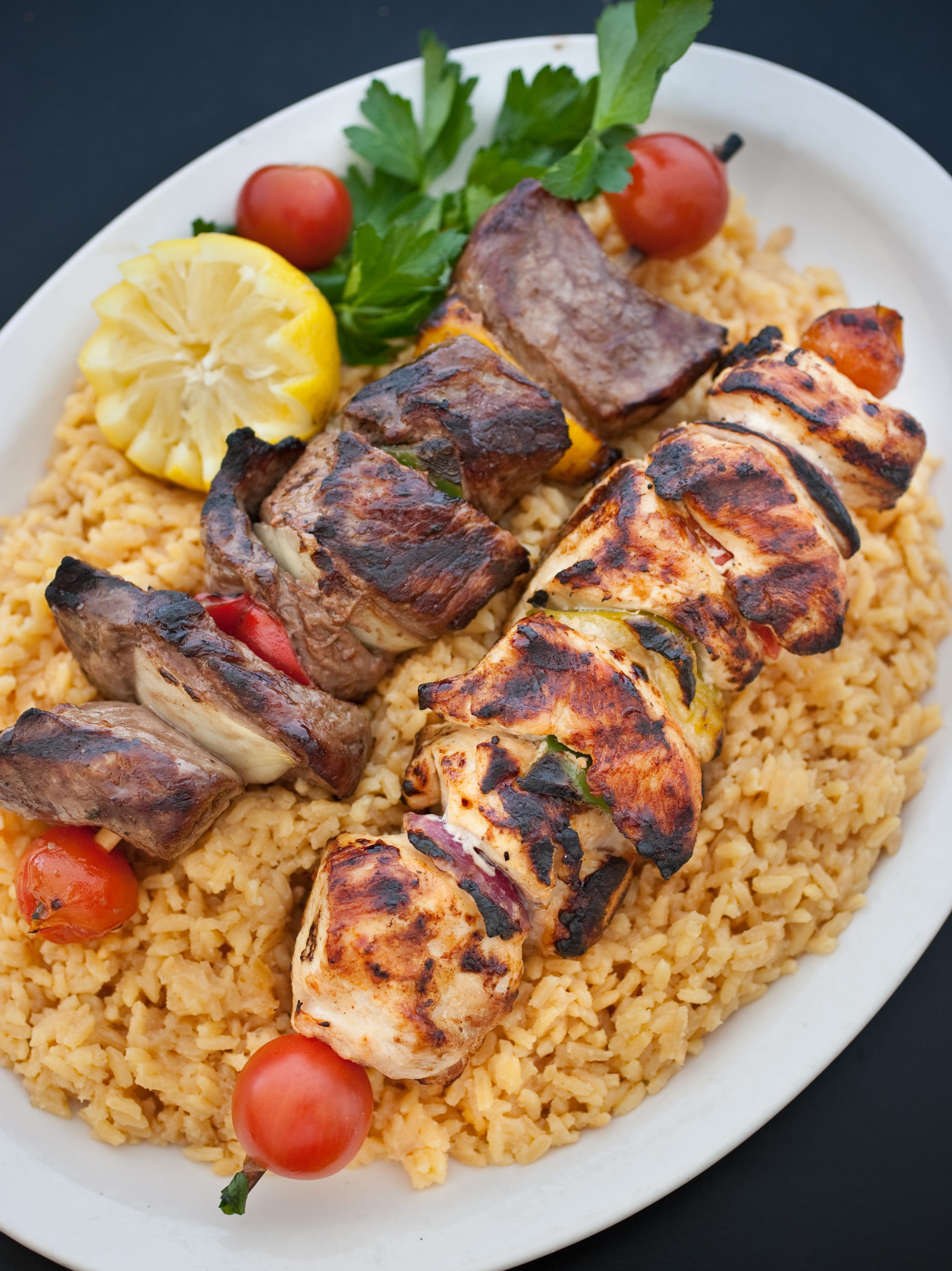 Beef And Chicken Kebabs With Yellow Rice Kebabs, tikkis and barbeques are various forms of patties, made with myriad ingredients like dals. beef and chicken kebabs with yellow rice