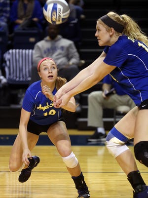 Angelo State’s Meghan Parker moves in to assist Mallory Blauser during the Belles’ game against Metro State in the NCAA South Central Regional Championship on Saturday.