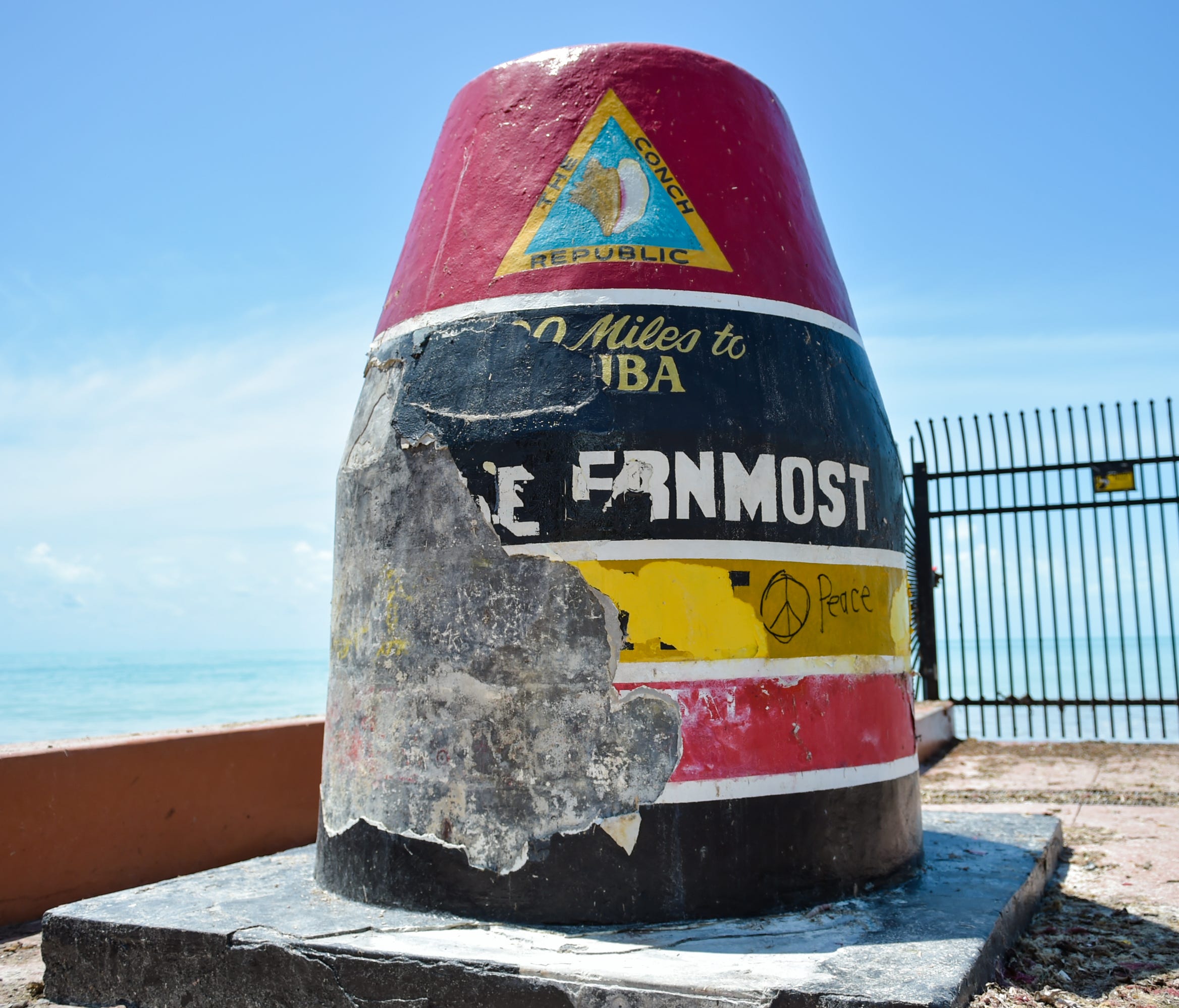 Layers of paint were stripped from the Southernmost Point marker in Key West, Fla. by Hurricane Irma.