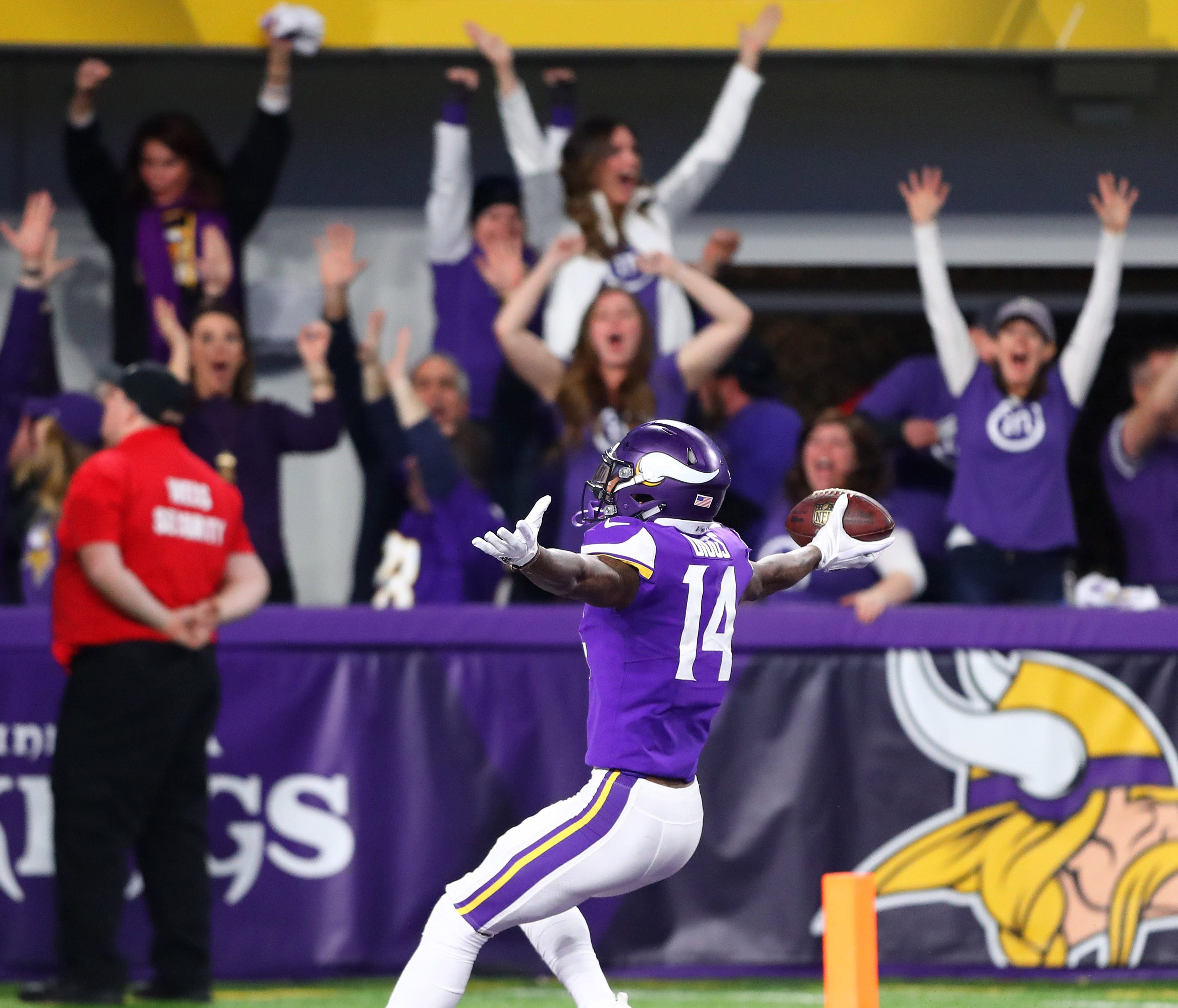Minnesota Vikings wide receiver Stefon Diggs celebrates as he scores the game winning touchdown against the New Orleans Saints at U.S. Bank Stadium.