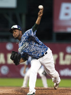 Lake Monster's relief pitcher Kevin Ferreras (40) delivers a pitch during the baseball game between the Auburn Doubledays and the Vermont Lake Monsters at Centennial Field on Wednesday night July 22, 2015 in Burlington, Vermont.