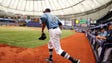 Tampa Bay's David Price (14) takes the field for the