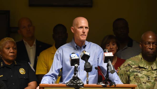 Surrounded by local St. Lucie County leaders, Gov. Scott delivered a press conference to warn Florida residents to take the threat of Hurricane Matthew seriously on Wednesday, Oct. 5, 2016 at the St. Lucie County Emergency Operations Center in Fort Pierce. Gov. Scott said Hurricane Matthew is a "potentially catastrophic storm" and encouraged residents to have a 3 day supply of water and food. "Do not take any chances and do not wait," Gov. Scott said.  "We can rebuild a home, we can rebuild a business, we cannot rebuild your life." He is expected to fly into Martin County today.
