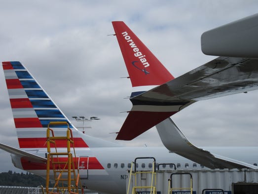 Boeing 737s painted in the colors of numerous airline