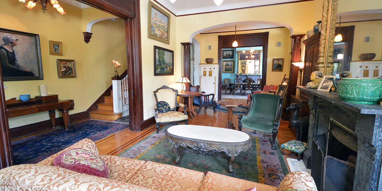 Couple restores trashed frat house to its former glory