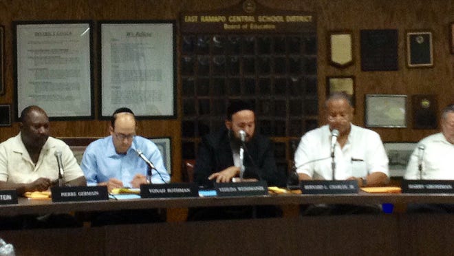 The East Ramapo Board of Education at a meeting July 1. The state-appointed monitor recommended diversity training for the board.