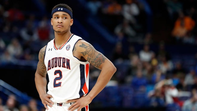 Auburn's Bryce Brown pauses during the second half in an NCAA college basketball quarterfinal game against Alabama at the Southeastern Conference tournament Friday, March 9, 2018, in St. Louis. Alabama won 81-63. (AP Photo/Jeff Roberson)
