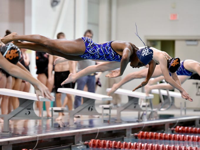 West York's Tesia Thomas dives for the 100-yard freestyle