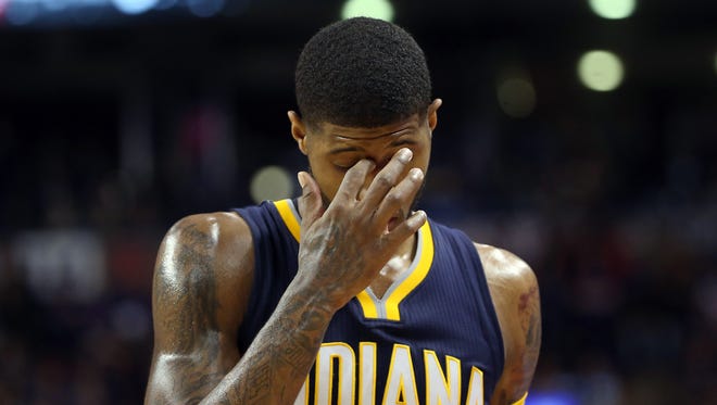 Apr 18, 2016; Toronto, Ontario, CAN; Indiana Pacers forward Paul George (13) reacts as he exits the game late in the fourth quarter against the Toronto Raptors in game two of the first round of the 2016 NBA Playoffs at Air Canada Centre. The Raptors beat the Pacers 98-87. Mandatory Credit: Tom Szczerbowski-USA TODAY Sports