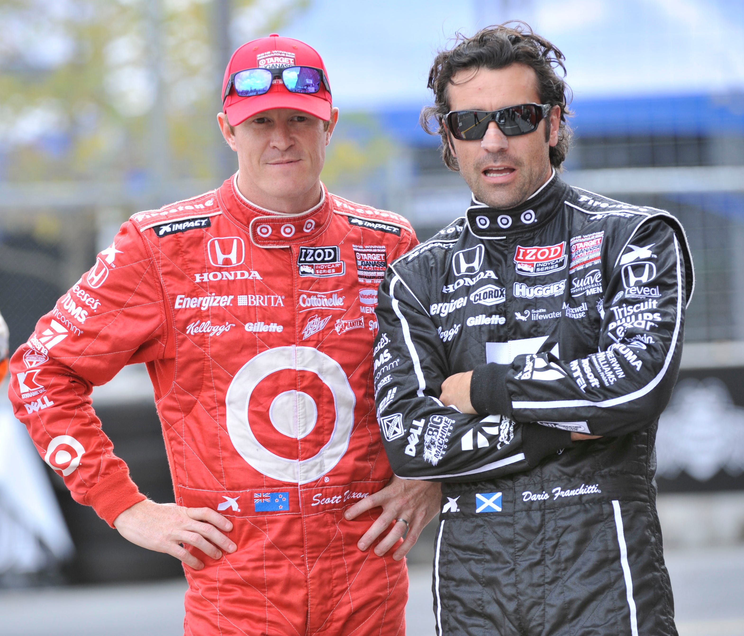 IndyCar Series drivers Scott Dixon, left, and Dario Franchitti talk in the pits during practice for the Grand Prix of Baltimore in 2013.