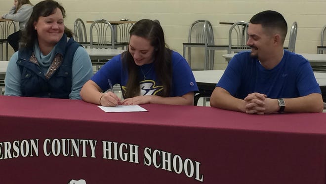 Henderson County senior Molly Wallace signs her letter of intent to play college softball at Spalding University in Louisville.