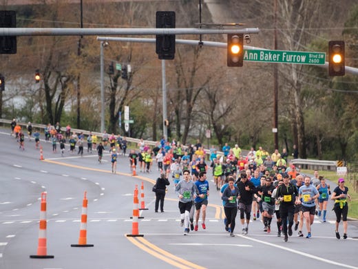 Marathoners run along Neyland Dr. on the third mile