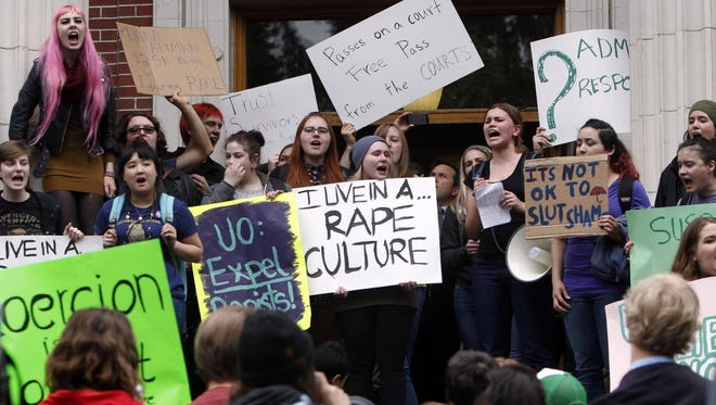 University of Oregon students and staff rally in Eugene in 2014.
