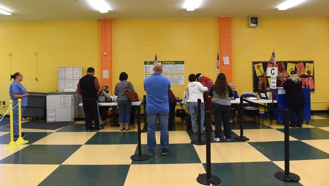 Voters cast their ballots at Sparks Middle School in Sparks on Nov. 8, 2016. 