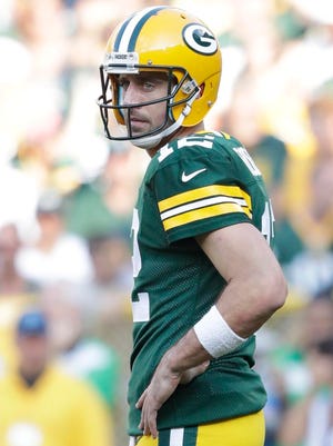 Green Bay Packers quarterback Aaron Rodgers (12) looks off field after a dropped pass in the second quarter Sunday, September 24, 2017, at Lambeau Field in Green Bay, Wis.