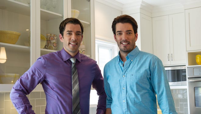 Jonathan Scott, left and Drew Scott are hosts of HGTV's "Property Brothers" but also have a song on the country charts as The Scott Brothers.