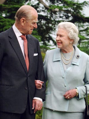 In public, protocol requires Philip to walk a few paces behind the queen, so it's rare to see them like this, arm-in-arm.  This picture is from June 2007 at Broadlands, Philip's family home in Hampshire.