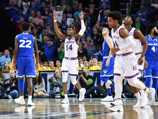 Kansas Jayhawks guard Malik Newman (14) celebrates