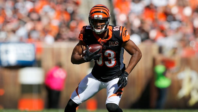 Cincinnati Bengals wide receiver Tyler Boyd (83) turns down field after making a catch in the first quarter of the NFL Week 4 game between the Cleveland Browns and the Cincinnati Bengals at FirstEnergy Stadium in downtown Cleveland on Sunday, Oct. 1, 2017. At halftime the Bengals led 21-0.