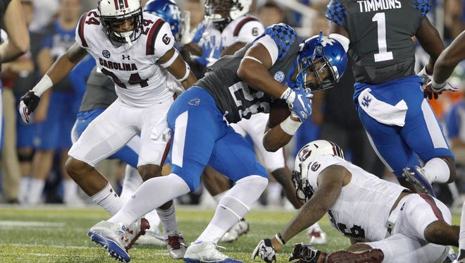 Sep 24, 2016; Lexington, KY, USA; Kentucky Wildcats running back Benny Snell (26) runs the ball against the South Carolina Gamecocks in the second half at Commonwealth Stadium. Kentucky defeated South Carolina 17-10.
