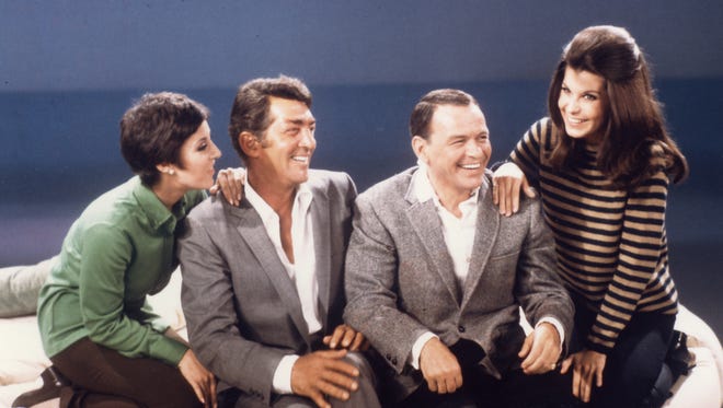 Photo of Deana and Dean Martin with Frank Sinatra and Tina Sinatra during the Dean Martin Christmas Special in 1967.