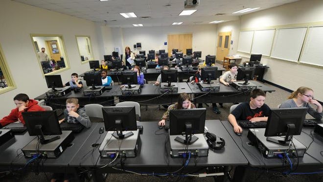 The federal "E-rate" program channels technology money to schools across the nation.