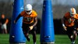 Daniel Bituli (35) and Landon Knoll (47) do a drill