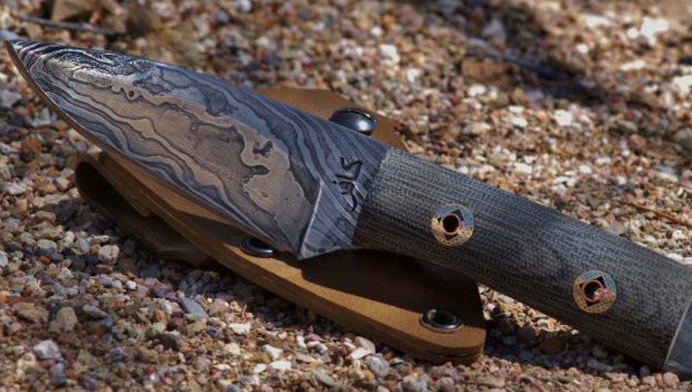 Marine vet's 'infidel' knives a pointed jab at enemy