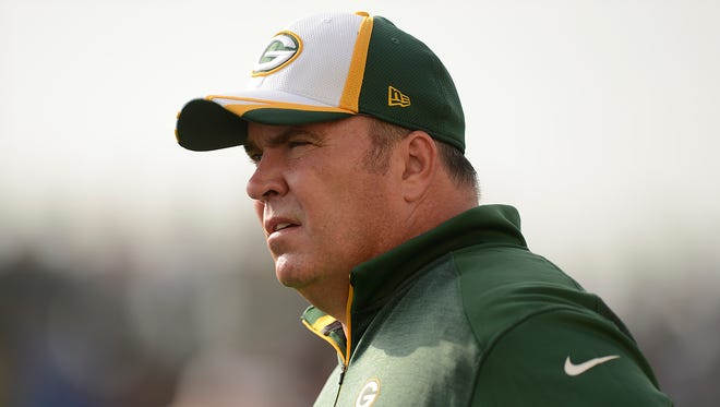 Green Bay Packers head coach Mike McCarthy looks on during training camp practice at Ray Nitschke Field.