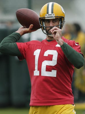 Green Bay Packers quarterback Aaron Rodgers (12) throws during OTA practice Tuesday, May 23, 2017, in Green Bay.