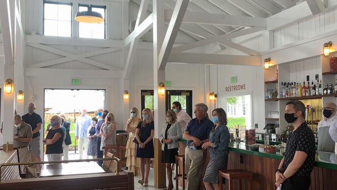 Guests at a preview event Tuesday are seen inside the Sand Bar at the Lake House on Canandaigua.