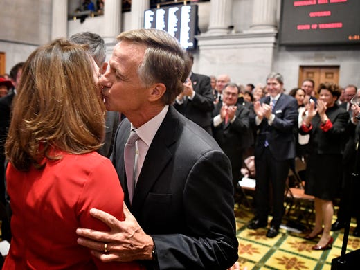 Gov. Bill Haslam stops to kiss his wife, Crissy, before